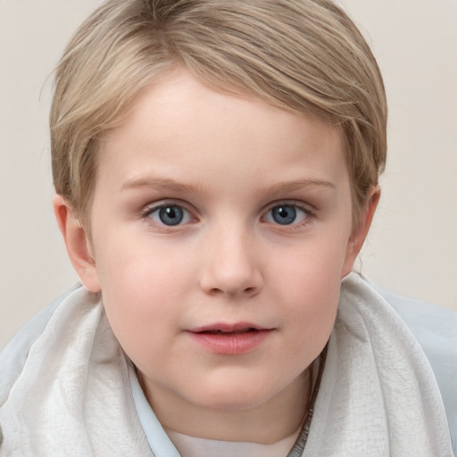 Joyful white child female with short  brown hair and blue eyes