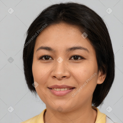 Joyful asian young-adult female with medium  brown hair and brown eyes