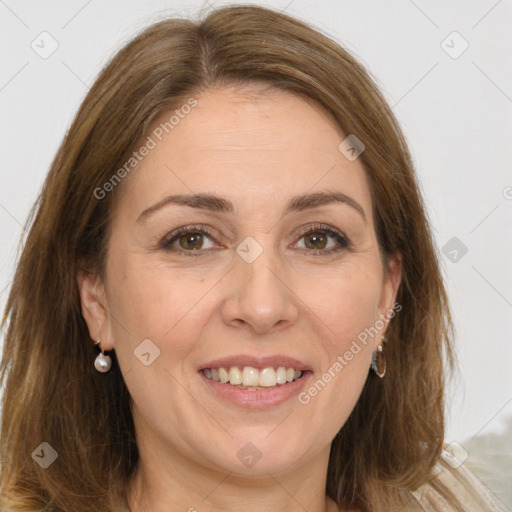 Joyful white adult female with long  brown hair and brown eyes