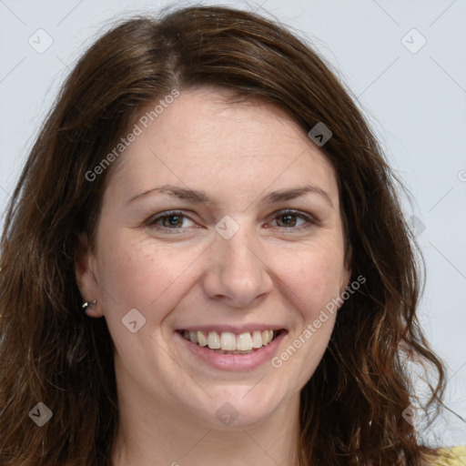 Joyful white adult female with long  brown hair and brown eyes