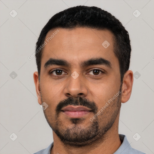 Neutral latino young-adult male with short  black hair and brown eyes