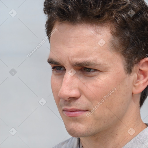 Neutral white adult male with short  brown hair and brown eyes