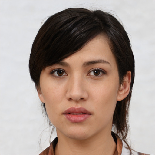 Neutral white young-adult female with medium  black hair and brown eyes