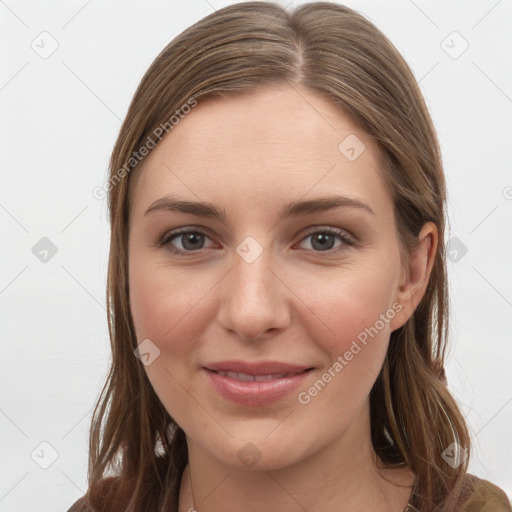 Joyful white young-adult female with long  brown hair and grey eyes