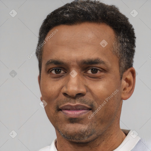 Neutral latino adult male with short  black hair and brown eyes