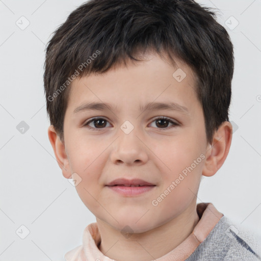 Joyful white child male with short  brown hair and brown eyes