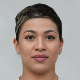 Joyful white young-adult female with short  brown hair and brown eyes