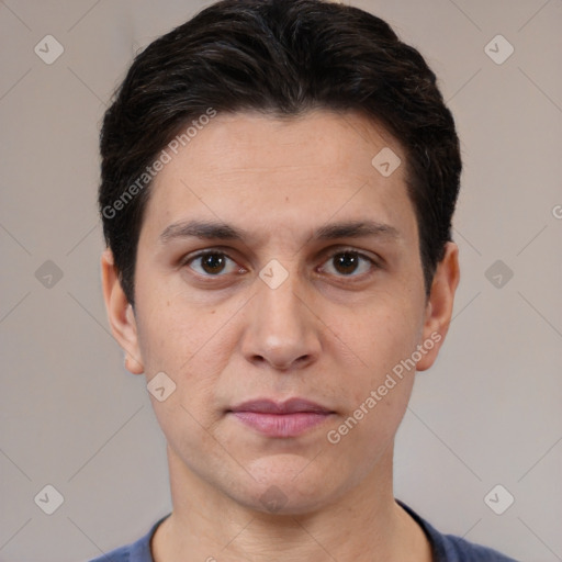 Joyful white young-adult male with short  brown hair and brown eyes