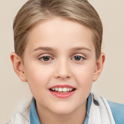 Joyful white child female with short  brown hair and brown eyes