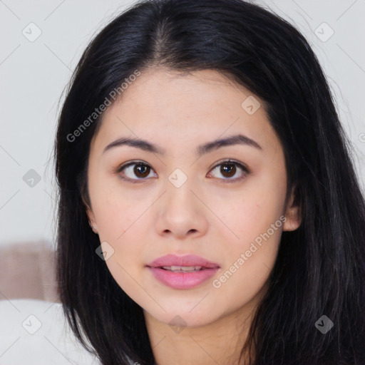 Joyful asian young-adult female with long  black hair and brown eyes