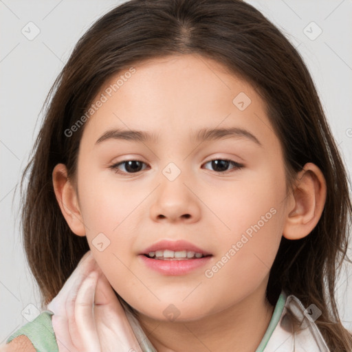 Joyful white child female with medium  brown hair and brown eyes