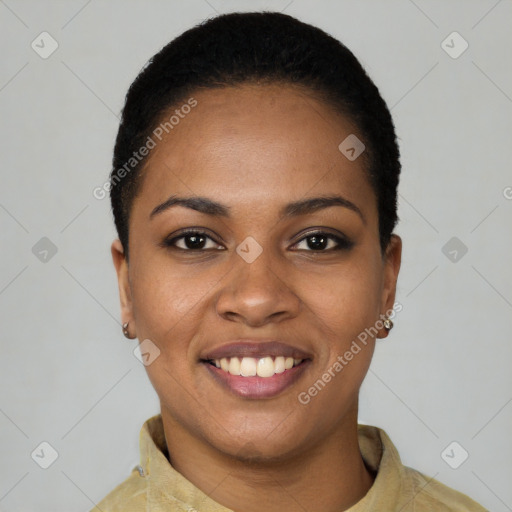 Joyful black young-adult female with short  black hair and brown eyes
