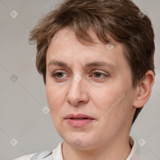 Joyful white adult female with short  brown hair and brown eyes