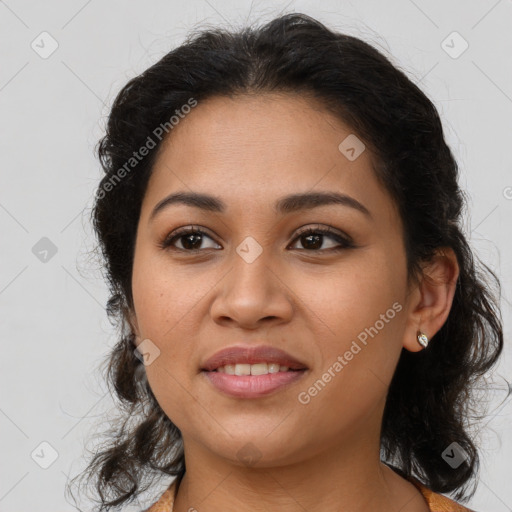 Joyful latino young-adult female with medium  brown hair and brown eyes