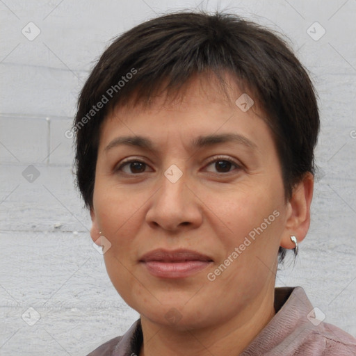 Joyful white adult female with short  brown hair and brown eyes