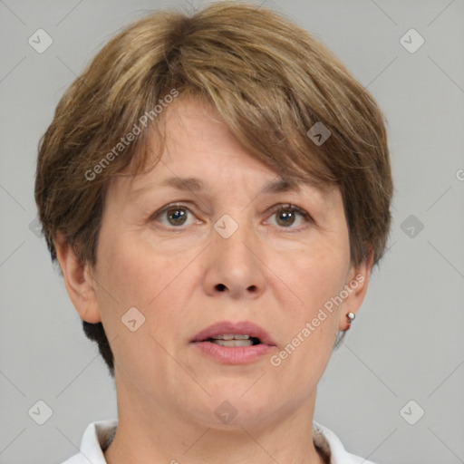 Joyful white adult female with short  brown hair and brown eyes