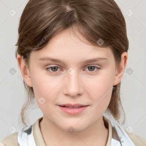 Joyful white child female with medium  brown hair and grey eyes