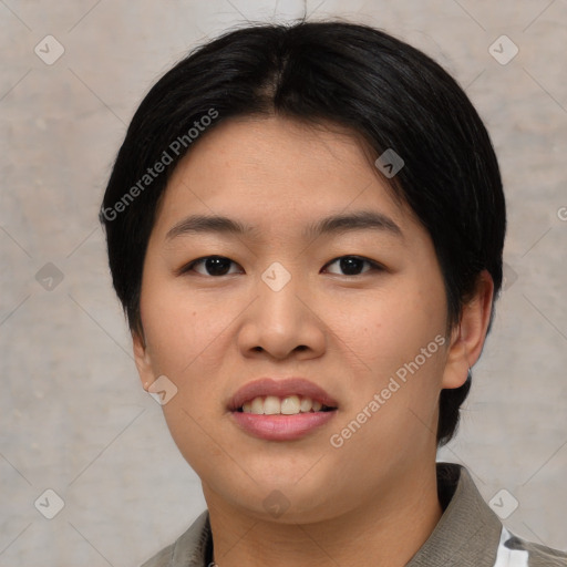 Joyful asian young-adult female with short  brown hair and brown eyes