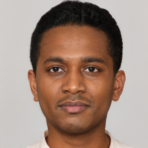 Neutral black young-adult male with short  black hair and brown eyes