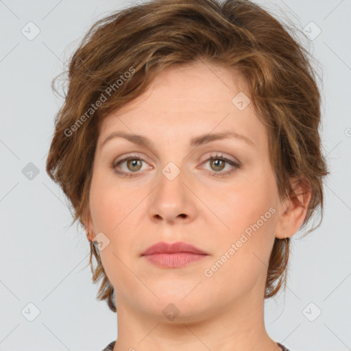 Joyful white young-adult female with medium  brown hair and green eyes