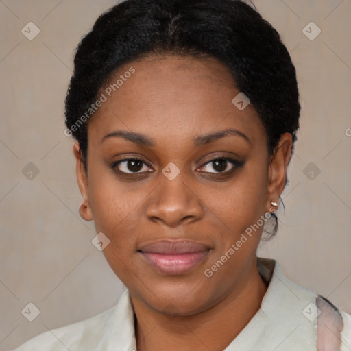 Joyful black young-adult female with short  black hair and brown eyes