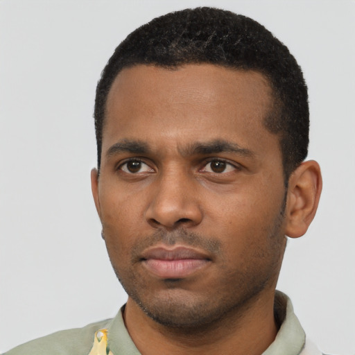 Neutral black young-adult male with short  black hair and brown eyes