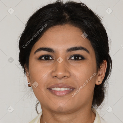 Joyful latino young-adult female with medium  brown hair and brown eyes