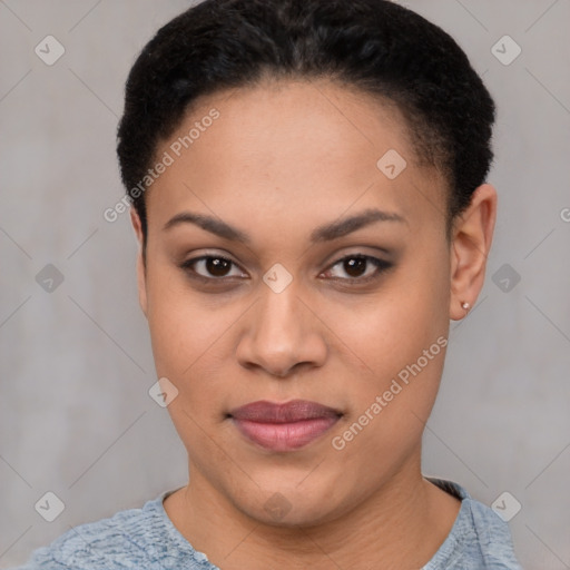 Joyful black young-adult female with short  brown hair and brown eyes