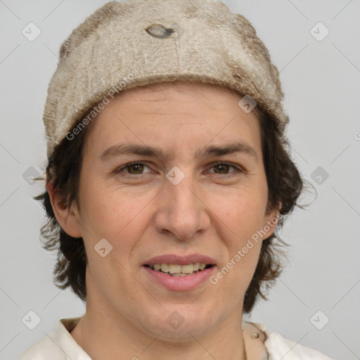 Joyful white adult female with short  brown hair and grey eyes