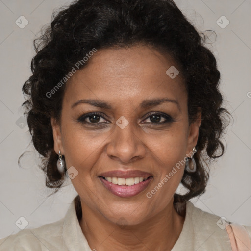 Joyful black adult female with medium  brown hair and brown eyes