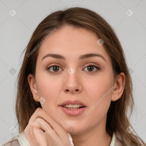 Joyful white young-adult female with medium  brown hair and grey eyes