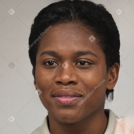 Joyful black young-adult female with short  black hair and brown eyes