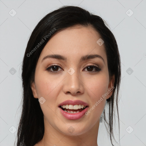 Joyful latino young-adult female with long  black hair and brown eyes