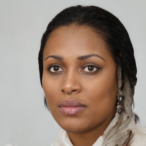 Neutral black young-adult female with medium  black hair and brown eyes