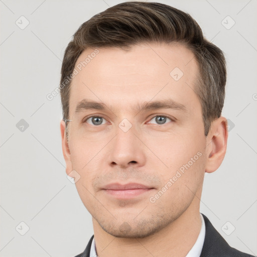 Neutral white young-adult male with short  brown hair and grey eyes