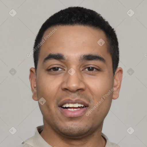 Joyful latino young-adult male with short  black hair and brown eyes
