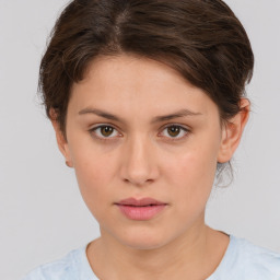 Neutral white young-adult female with short  brown hair and brown eyes