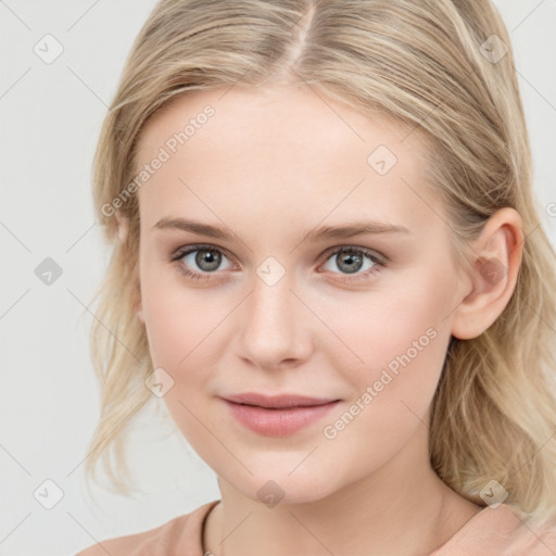 Joyful white young-adult female with medium  brown hair and blue eyes