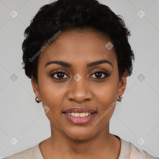 Joyful black young-adult female with short  black hair and brown eyes