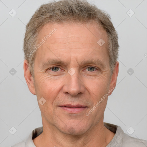 Joyful white middle-aged male with short  brown hair and brown eyes