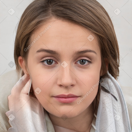 Neutral white young-adult female with medium  brown hair and brown eyes