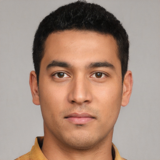 Neutral latino young-adult male with short  black hair and brown eyes