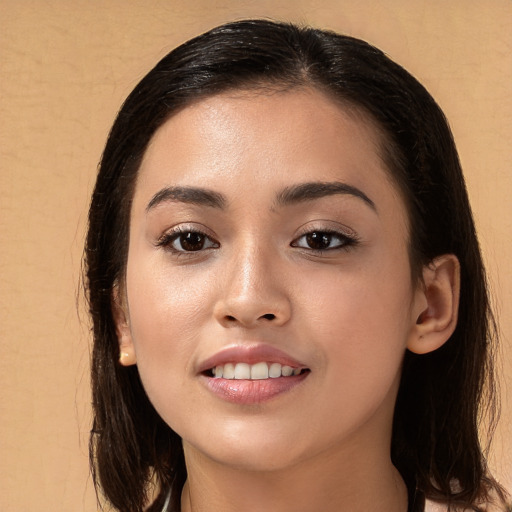 Joyful white young-adult female with long  brown hair and brown eyes