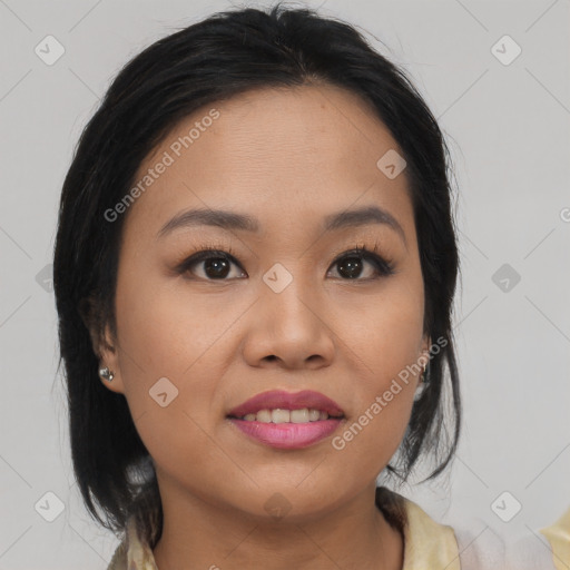 Joyful asian young-adult female with medium  brown hair and brown eyes