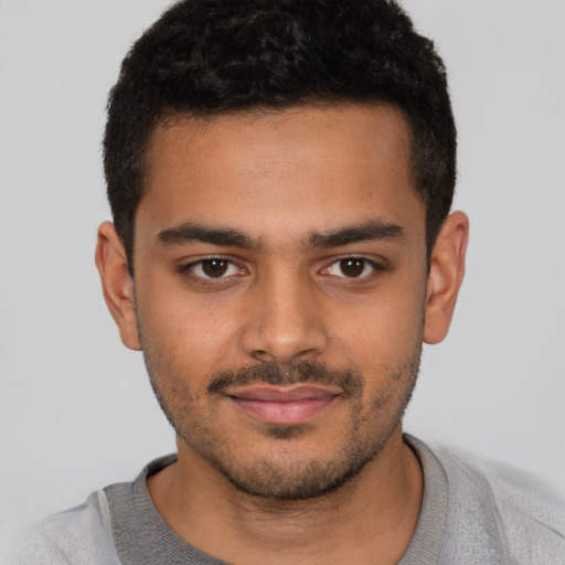 Neutral latino young-adult male with short  brown hair and brown eyes