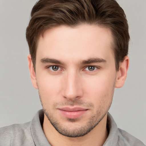 Neutral white young-adult male with short  brown hair and grey eyes