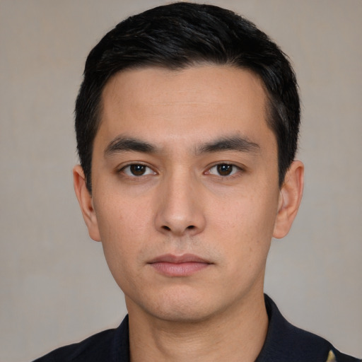 Neutral white young-adult male with short  black hair and brown eyes