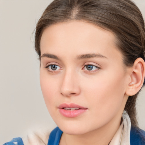 Neutral white young-adult female with medium  brown hair and blue eyes