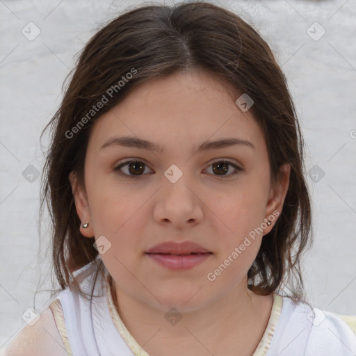 Joyful white child female with medium  brown hair and brown eyes