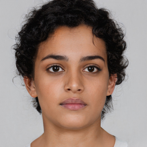Neutral latino young-adult female with short  brown hair and brown eyes
